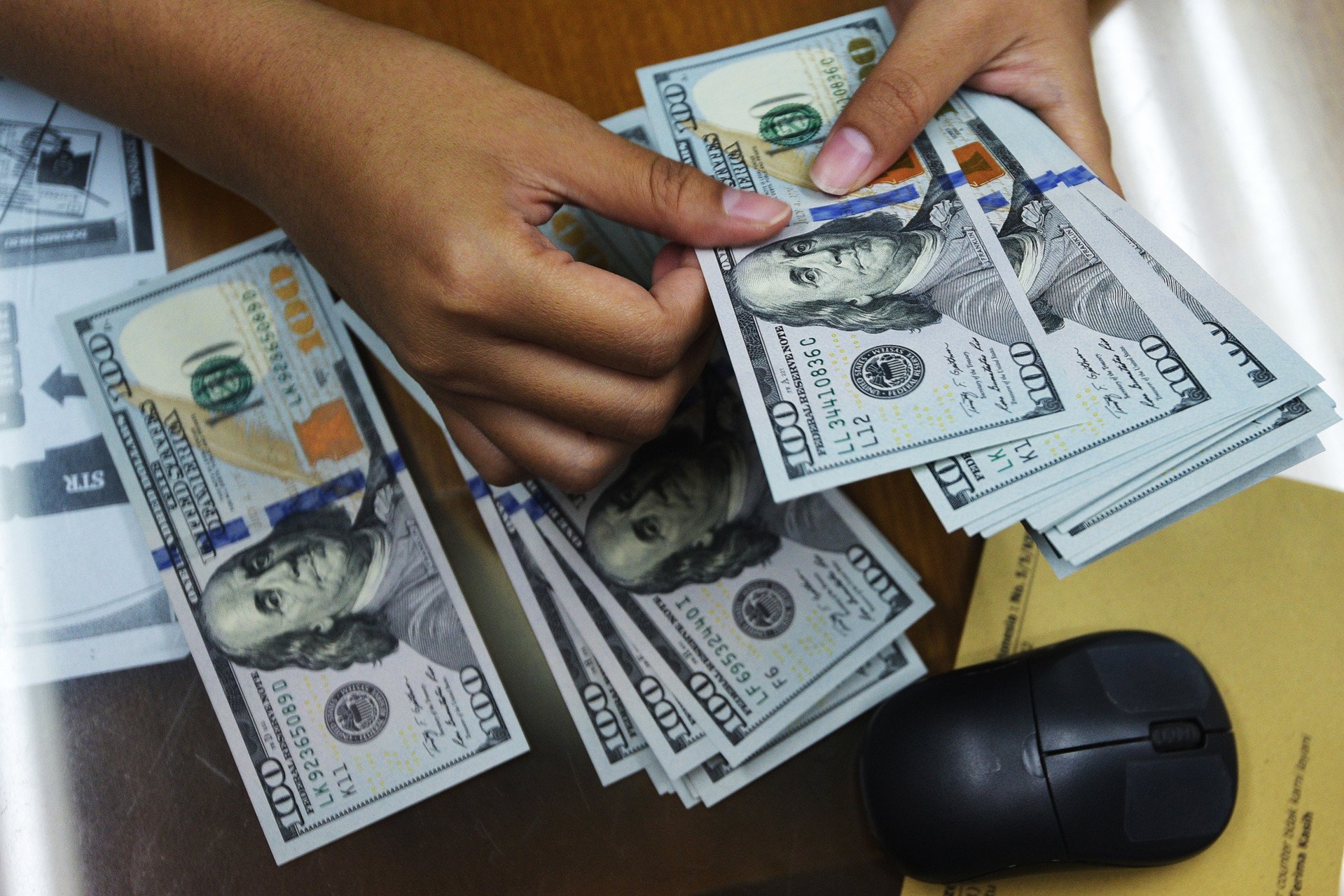 SWF Terbesar Dunia Pangkas Investasi pada Obligasi Pemerintah AS